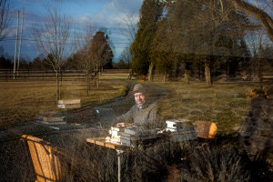 James E. Hansen of NASA, retiring this week, reflected in a window at his farm in Pennsylvania. 