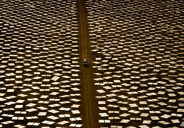At California's Ivanpah Solar, near Primm, 3,500 acres of mirrors are used to focus sunlight onto three boiler towers to generate up to 377 megawatts of electricity, enough for more than 100,000 California homes. Secretary of the Interior Sally Jewell visited the facility Monday.
